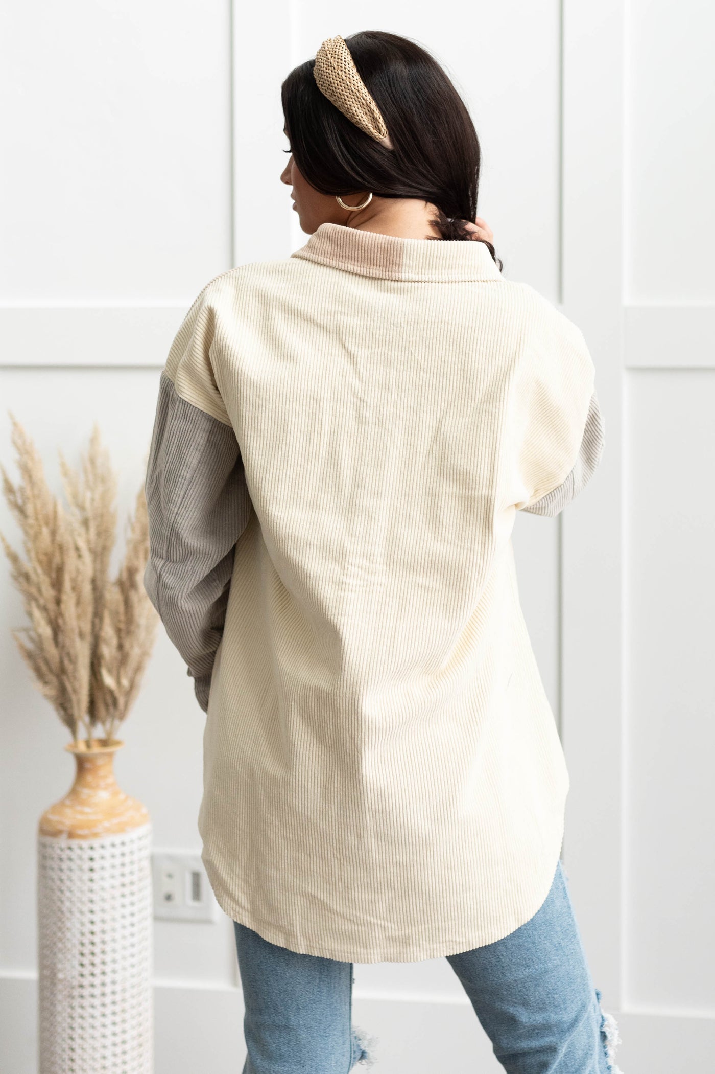 back view of a ivory shacket