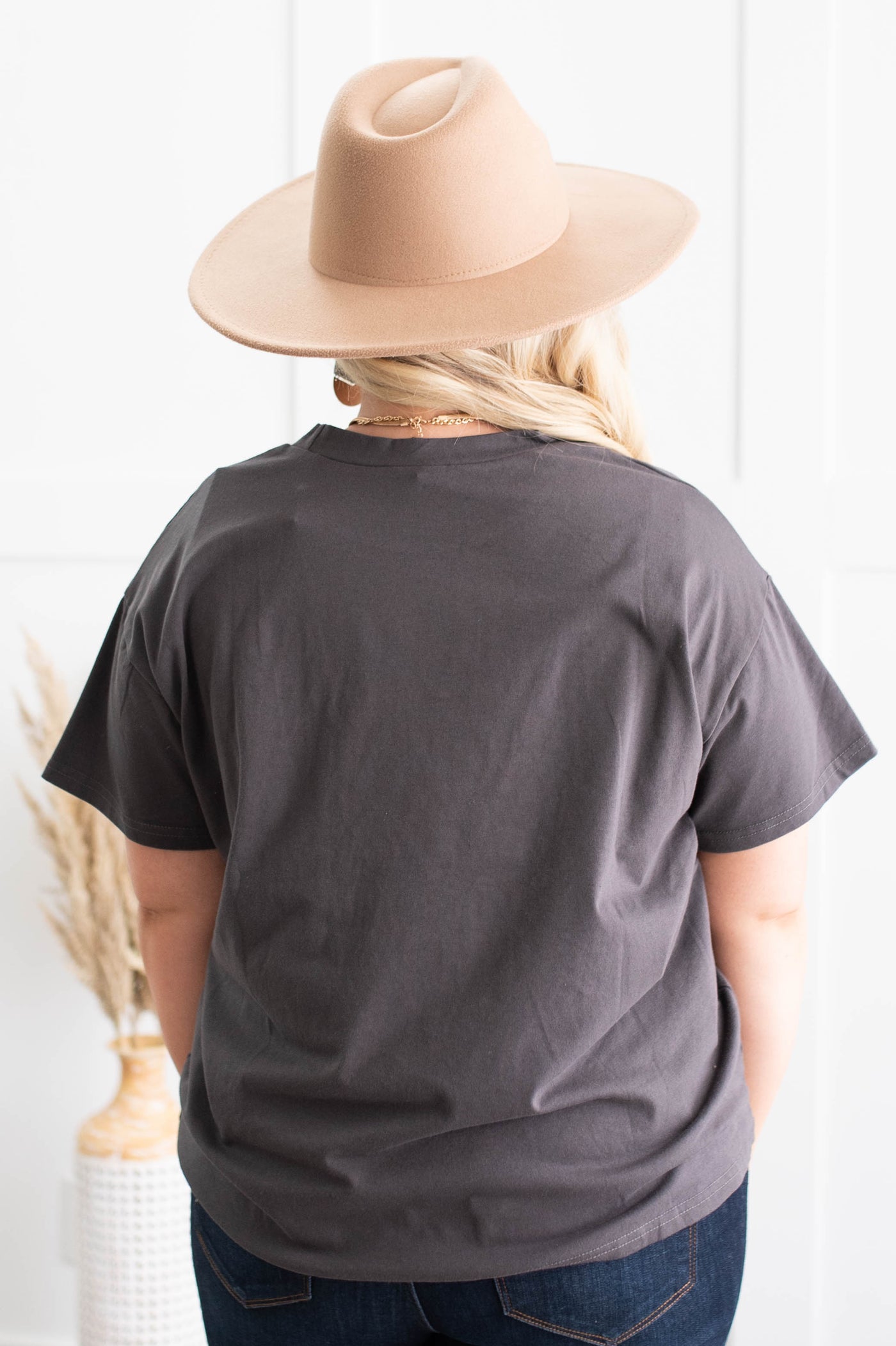 Back view of a plus size charcoal tee