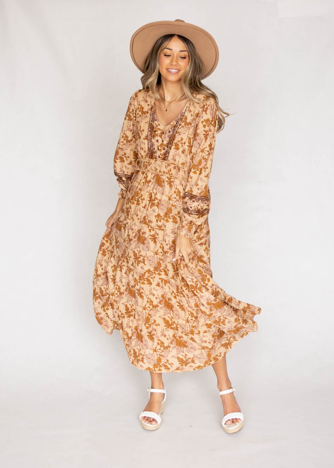 Tie at the neck camel dress with a floral print