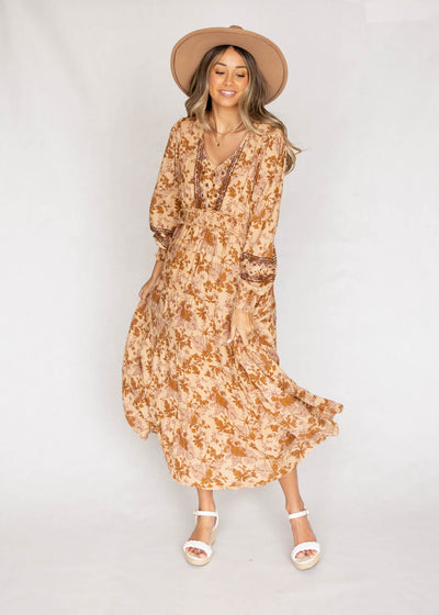 Tie at the neck camel dress with a floral print