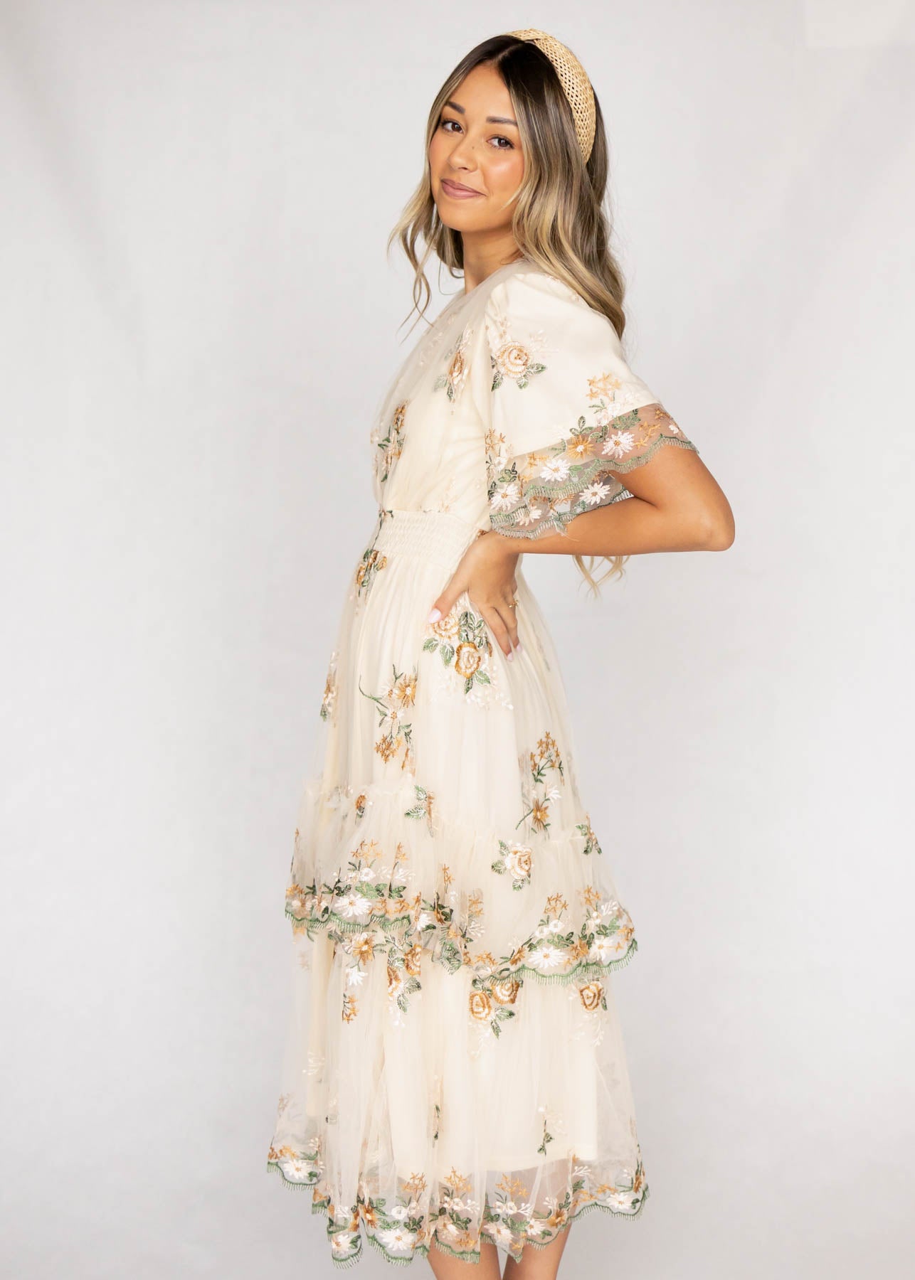 Side view of a wild flower taupe dress