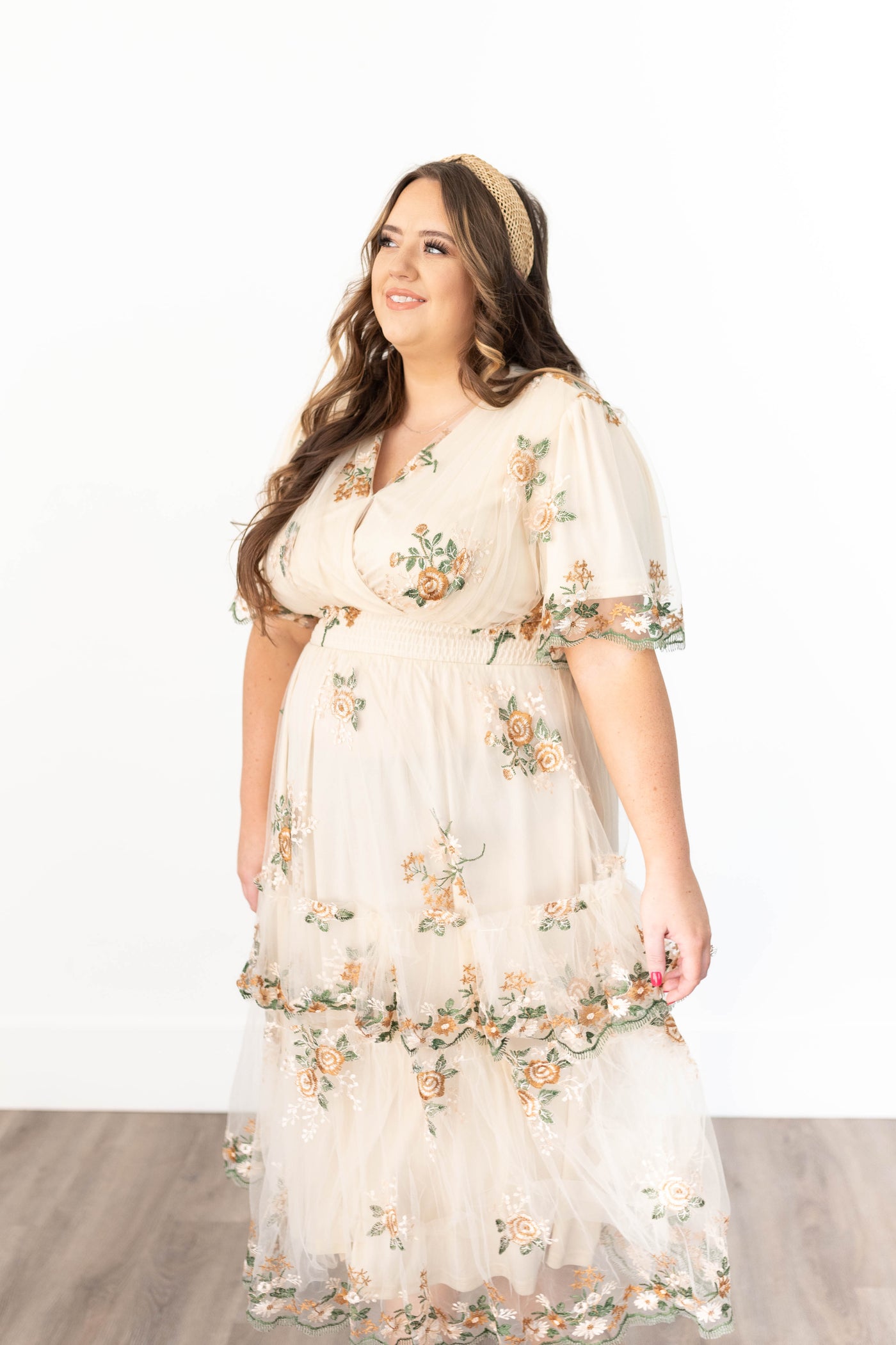 Short sleeve plus size flower taupe dress with a v-neck 