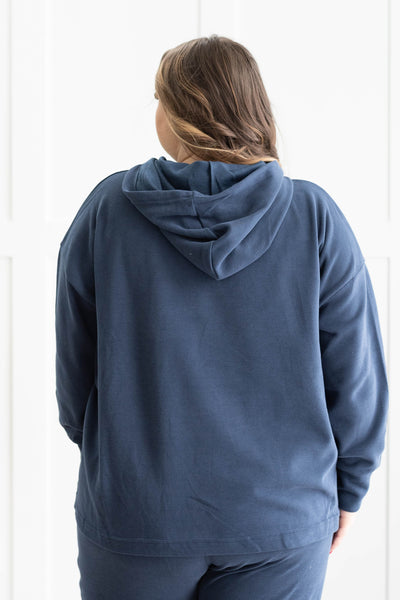 Back view of the top of a plus size navy set