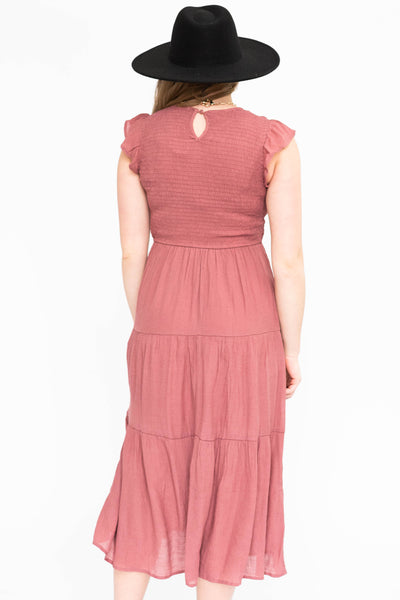 Back view of a dusty mauve dress