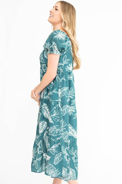 Side view of a teal floral dress