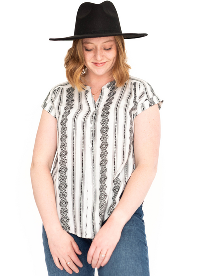 White short sleeve top with black pattern